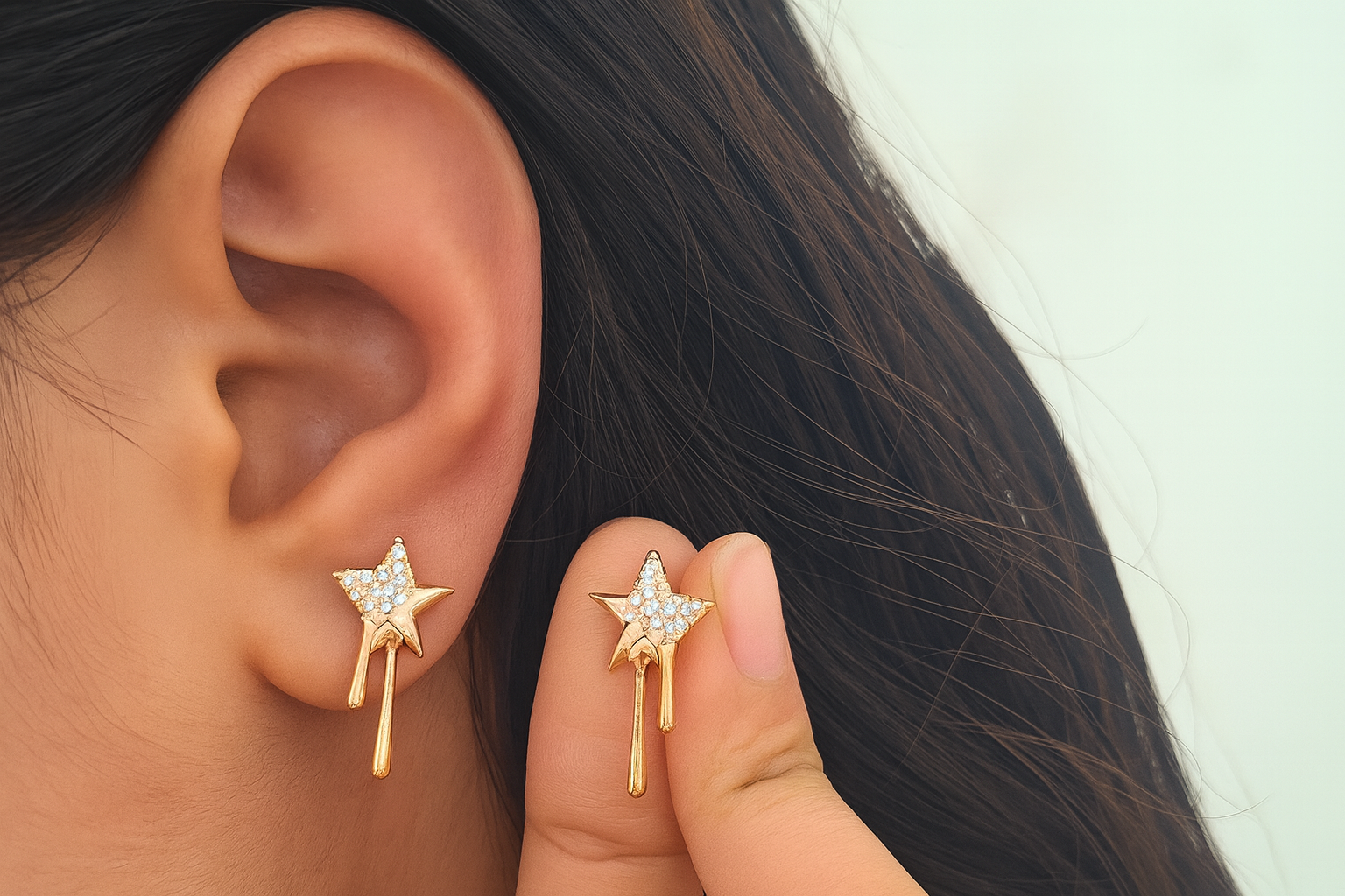 celestial gold earrings close up